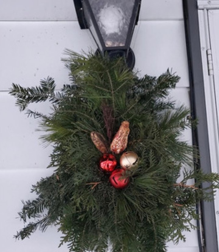 Option #1 Pine Bough with pine cones and jingle bells. $30